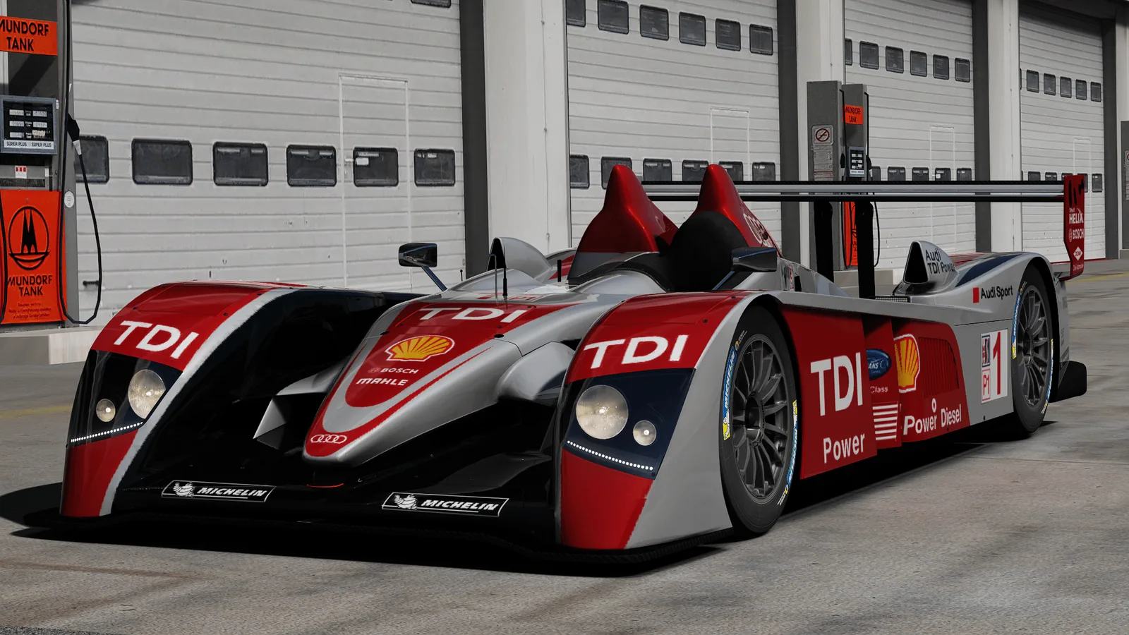 Audi R10 TDI on the starting grid with pit crew