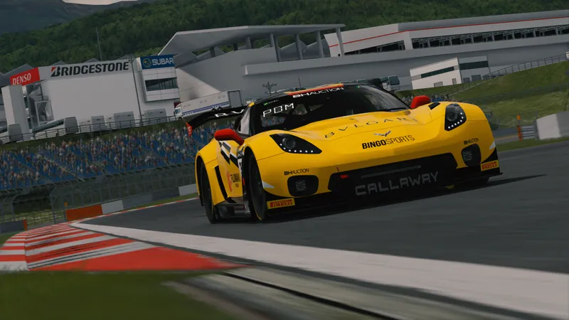 Corvette C7 GT3-R in yellow livery, front view at night